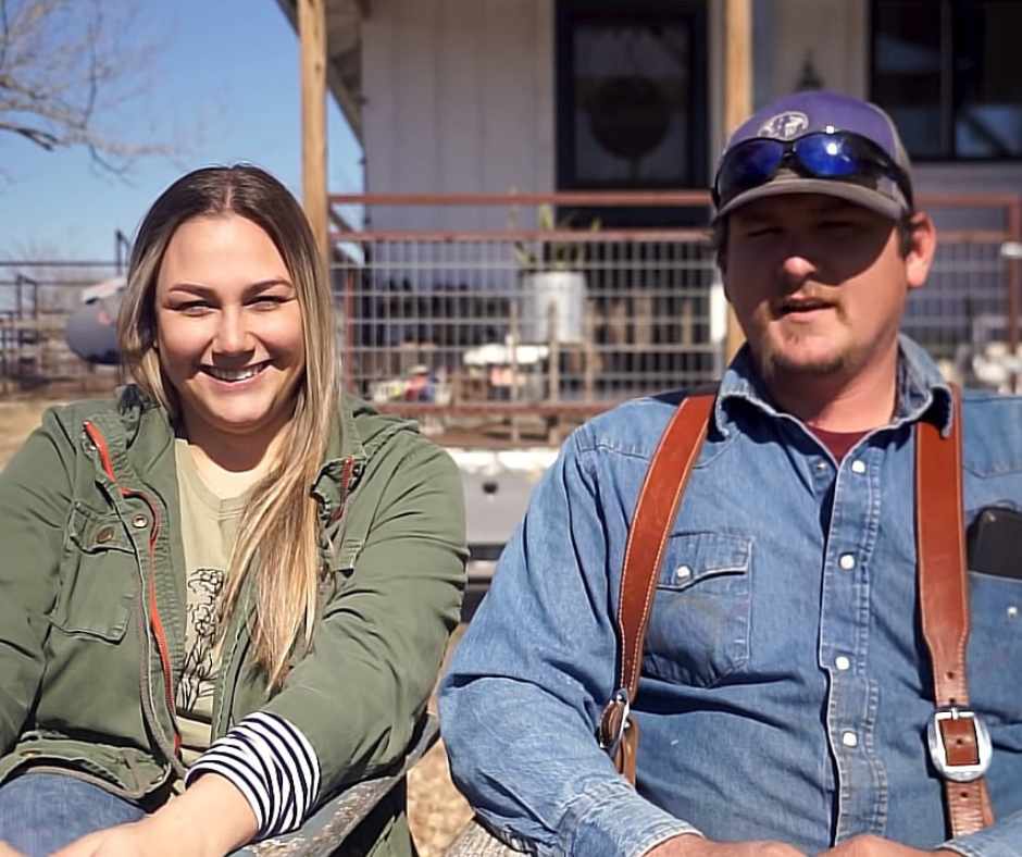 Katy and Michael Krebs sitting in front of their house telling about their journey of turning an old shed into a tiny home.