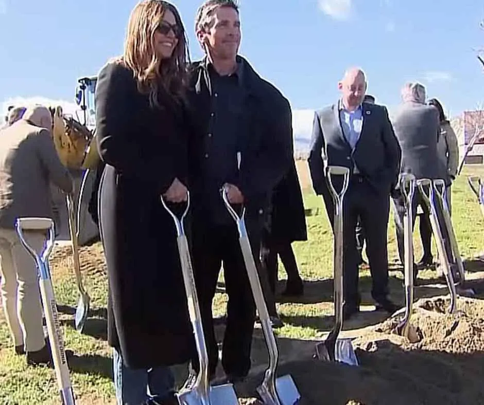 Christian Bale and his wife Sibi Blažić, both holding a shovel for the ground breaking ceremony.
