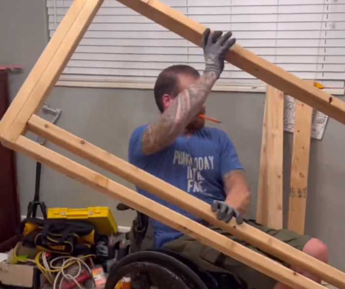 Dan building the special bunkbeds