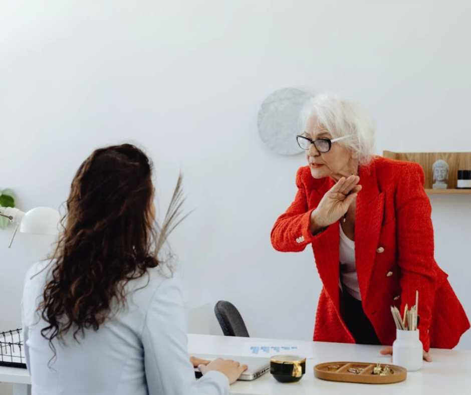 Elderly woman and a younger woman arguing