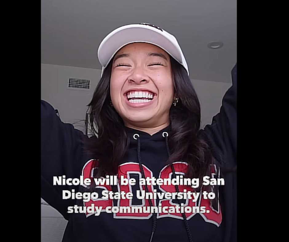 Nicole, wearing an SDSU jacket, and a big smile on her face