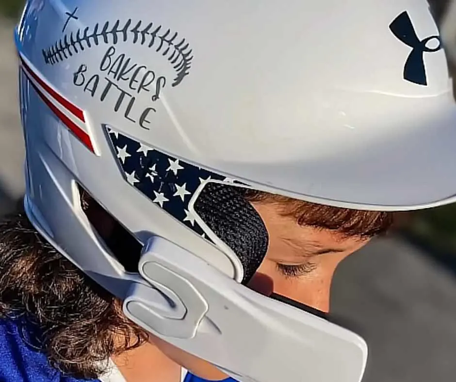 Branson wearing baseball helmet with Bakers sticker