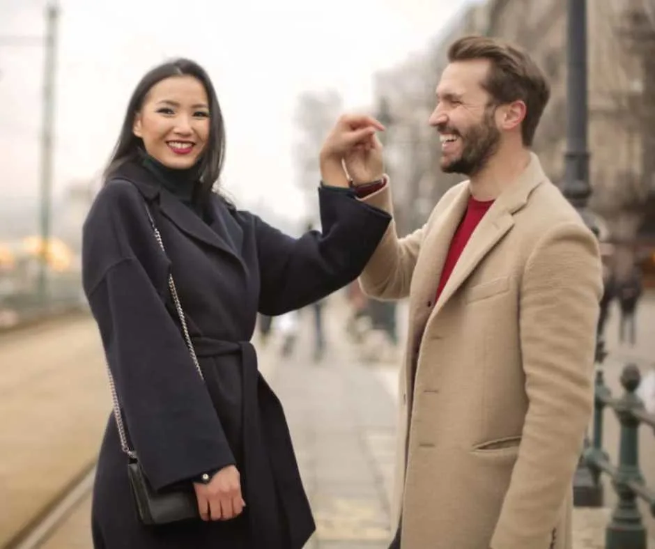 Man standing beside a woman