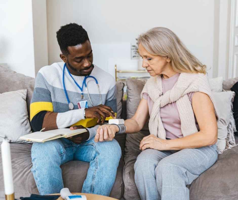 Elderly woman being checked by a doctor